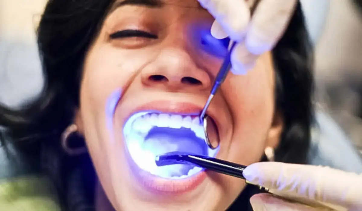 Patient receiving professional Zoom! Whitening treatment for brighter teeth